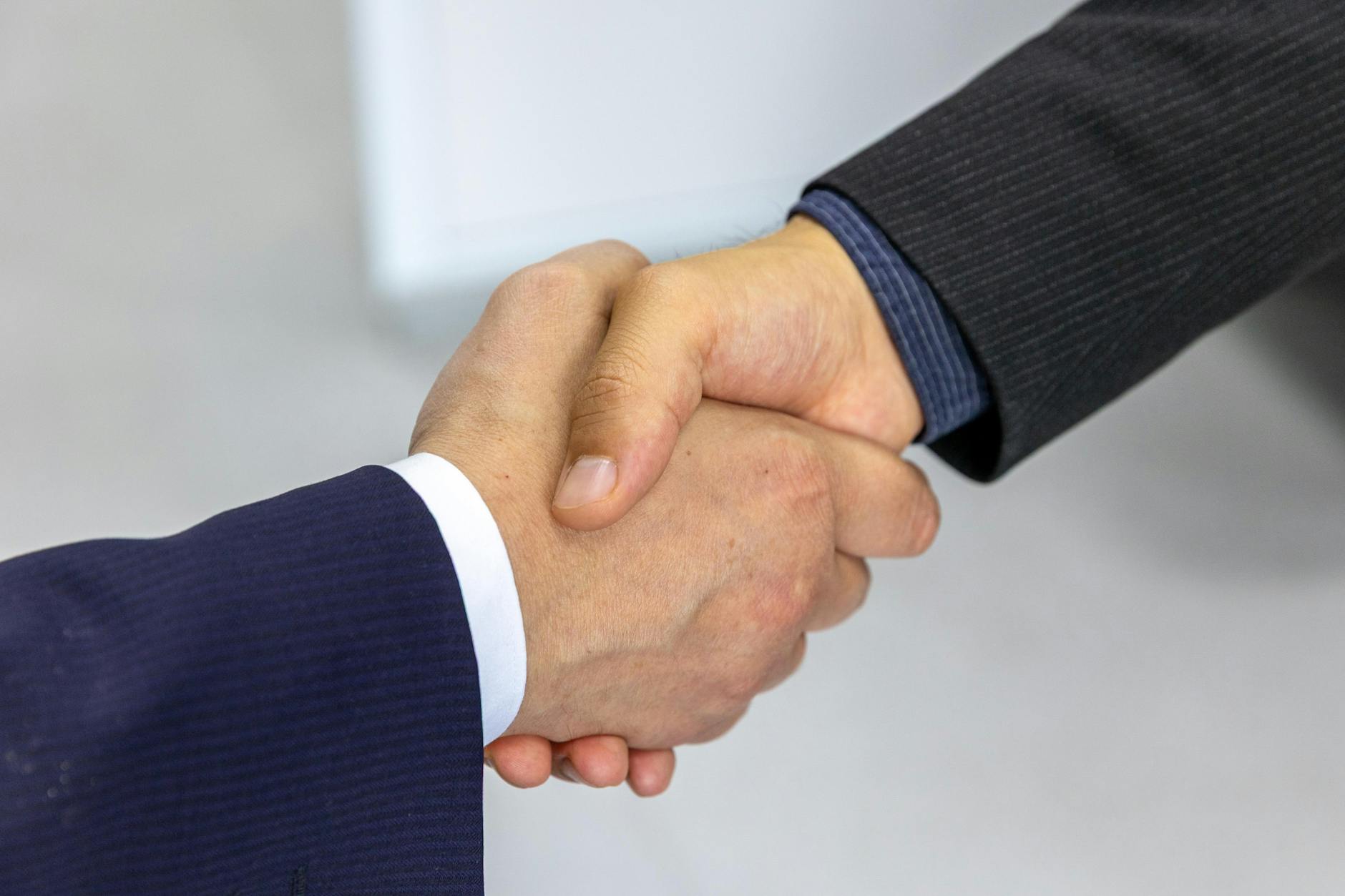 The Handshake Was Never About Friendship — Here's What It Was Actually For